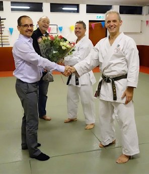 Het bestuur feliciteert Rob en Bert